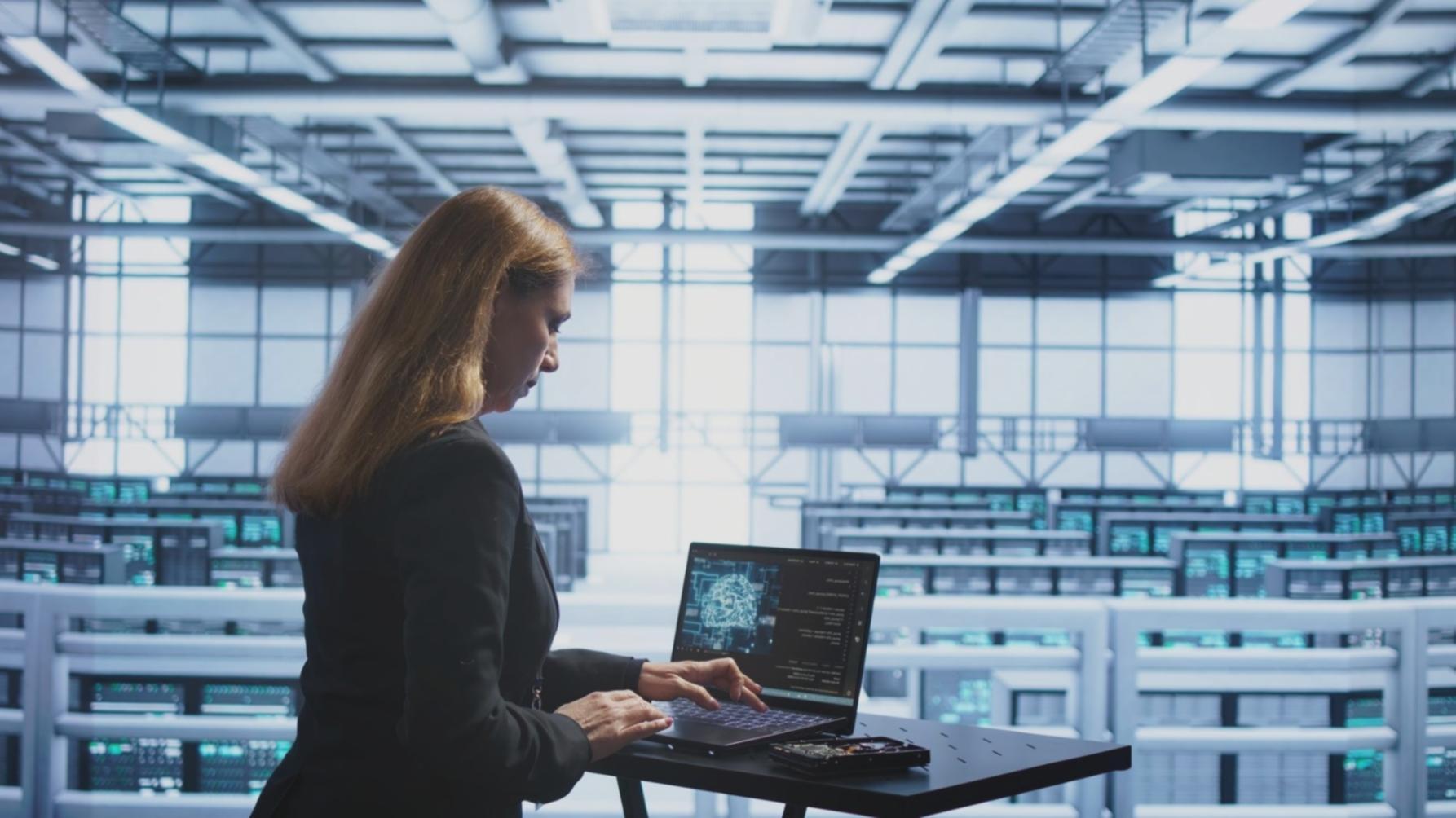 Students working on blockchain development projects in collaborative environment