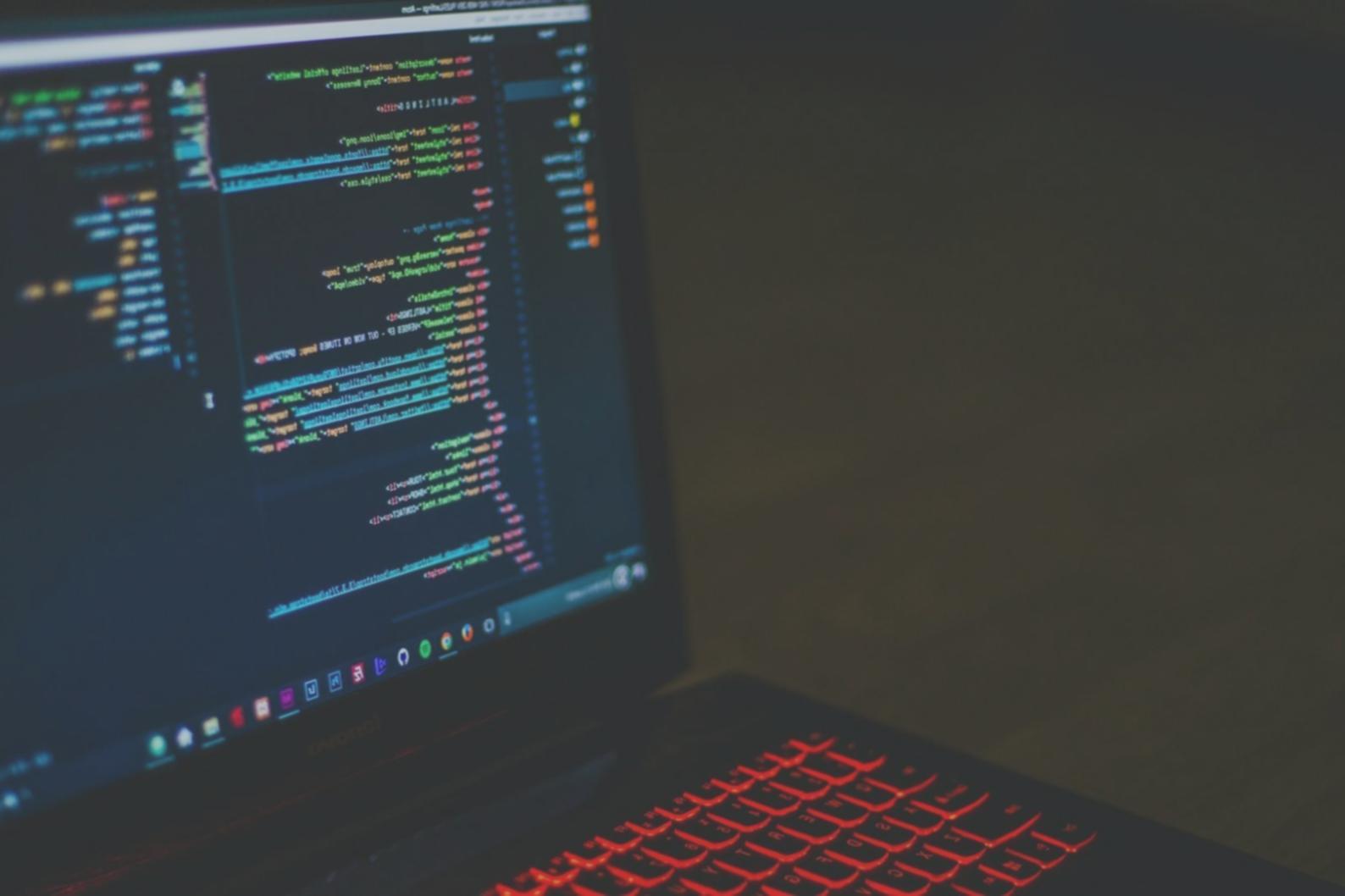 Team of developers collaborating on blockchain implementation and code review